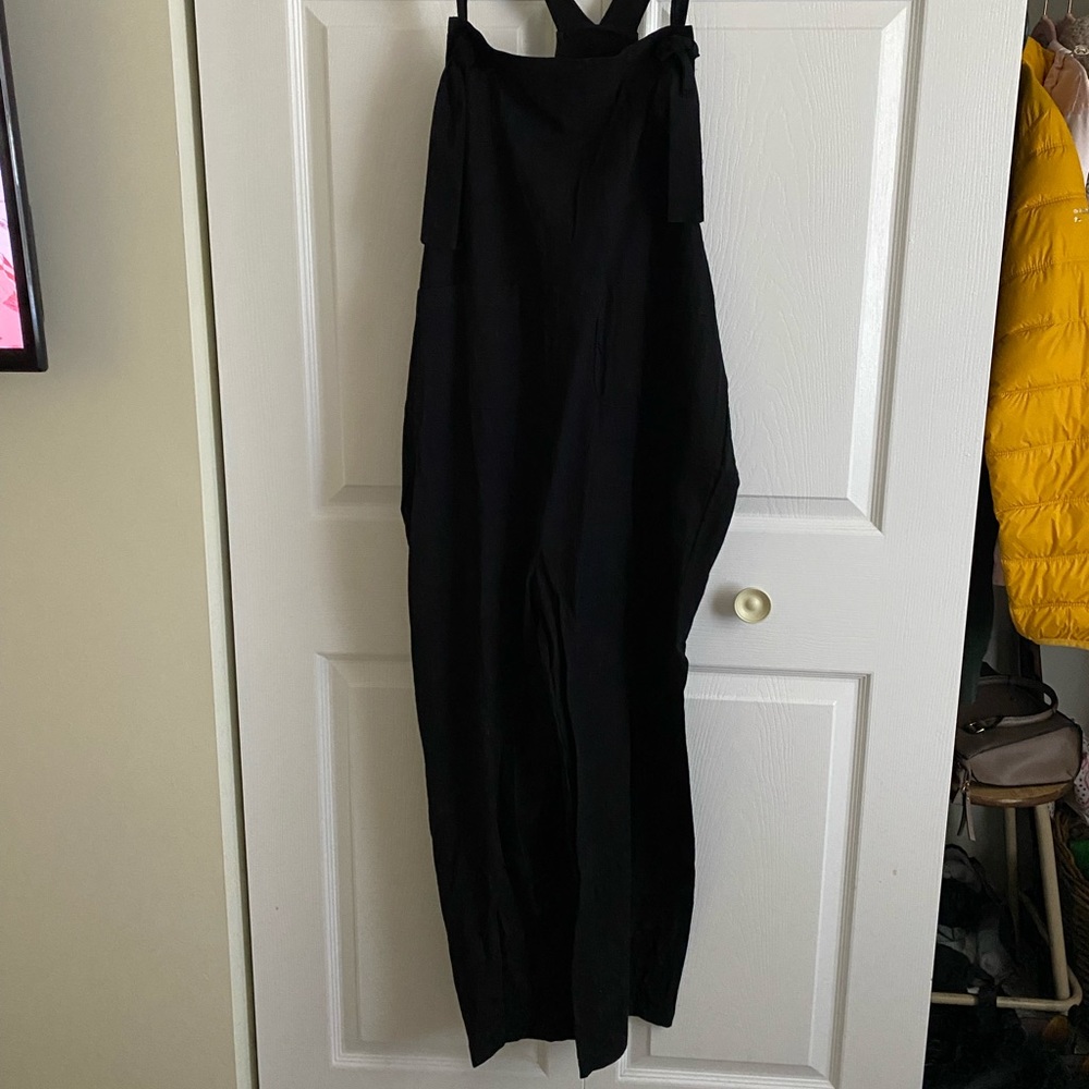 Black jumper/ overalls